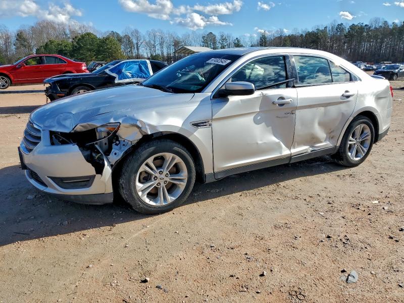 FORD TAURUS SEL 2013 with VIN 1FAHP2E83DG176696 - Photo from auction