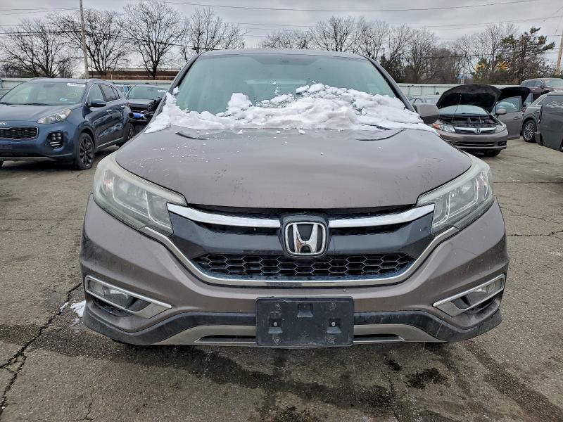 Photo 5 from auction – 2015 HONDA CR-V EX with VIN 2HKRM4H51FH698018