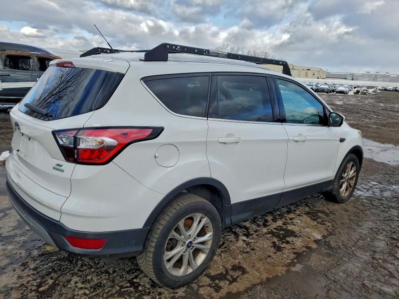 Photo 3 from auction – 2018 FORD ESCAPE SE with VIN 1FMCU0GD9JUC50191