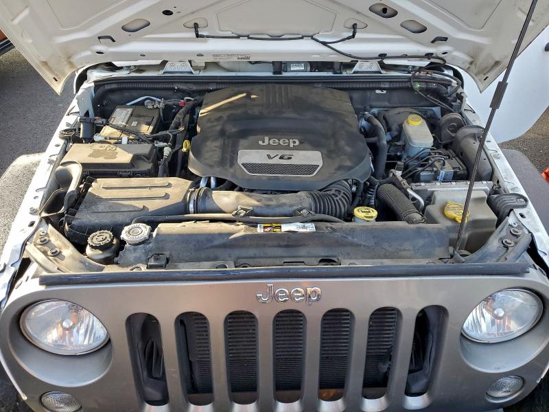 Photo 11 from auction – 2014 JEEP WRANGLER U with VIN 1C4BJWDG4EL235782