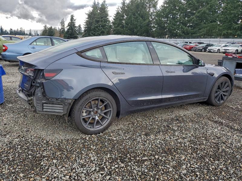 Photo 3 from auction – 2022 TESLA MODEL 3 with VIN 5YJ3E1EB5NF310684