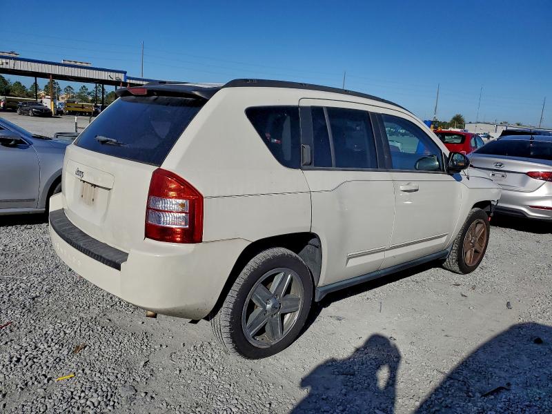 Photo 3 from auction – 2010 JEEP COMPASS SP with VIN 1J4NT4FB0AD601880