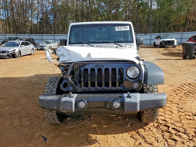 Photo 5 from auction – 2015 JEEP WRANGLER with VIN 1C4AJWAG8FL596868