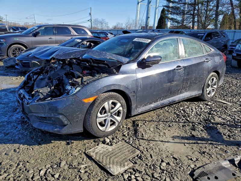 HONDA CIVIC LX 2018 with VIN 2HGFC2F52JH574582 - Photo from auction