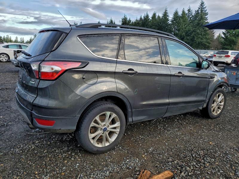 Photo 3 from auction – 2018 FORD ESCAPE SE with VIN 1FMCU0GD3JUB76279
