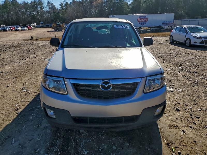 Photo 5 from auction – 2011 MAZDA TRIBUTE with VIN 4F2CY0C77BKM05360