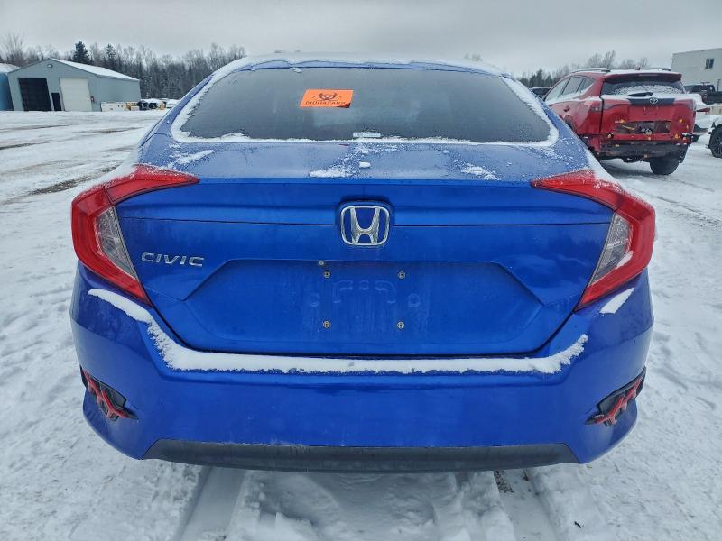 Photo 6 from auction – 2016 HONDA CIVIC LX with VIN 2HGFC2F54GH024972