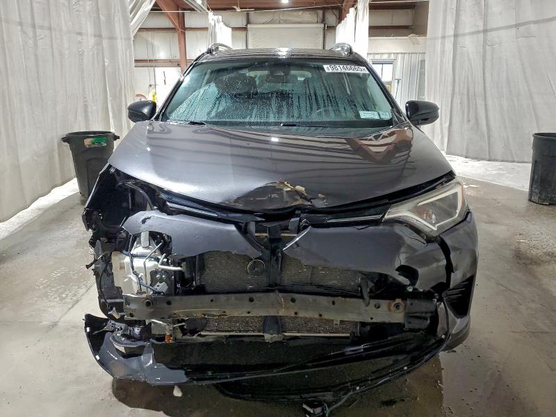 Photo 5 from auction – 2017 TOYOTA RAV4 LE with VIN JTMBFREV5HJ713725