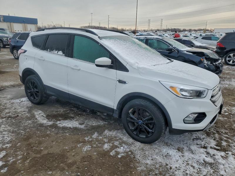 Photo 4 from auction – 2018 FORD ESCAPE SE with VIN 1FMCU9GD4JUA45799