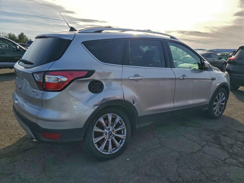 Photo 3 from auction – 2018 FORD ESCAPE TIT with VIN 1FMCU9J94JUC62094