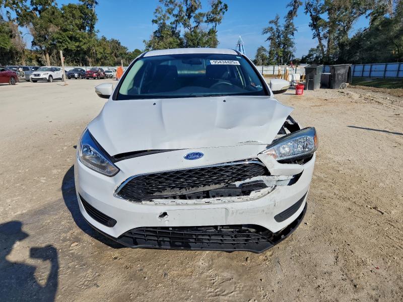 Photo 5 from auction – 2015 FORD FOCUS SE with VIN 1FADP3F20FL268664