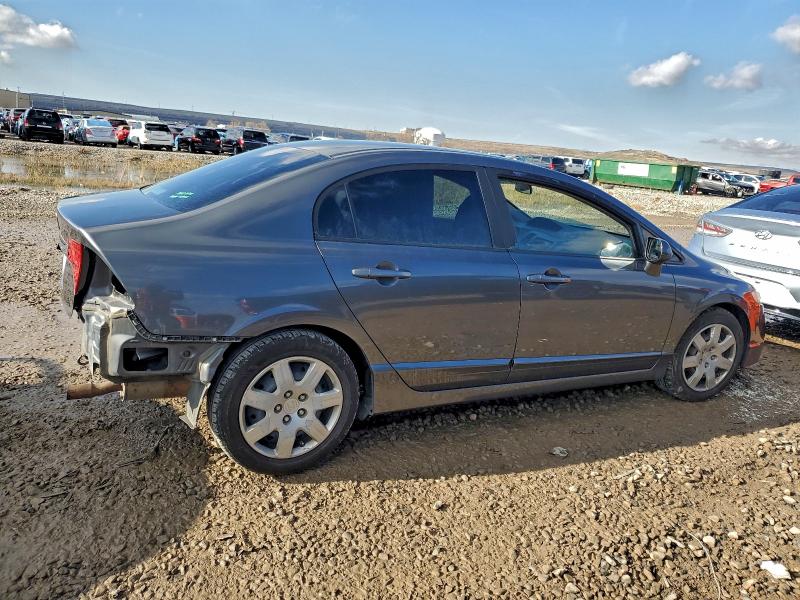 Photo 3 from auction – 2010 HONDA CIVIC LX with VIN 19XFA1F5XAE045620