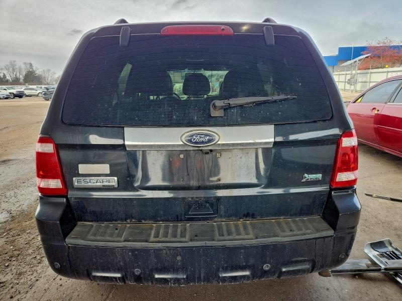 Photo 6 from auction – 2011 FORD ESCAPE LIM with VIN 1FMCU9EGXBKA06774