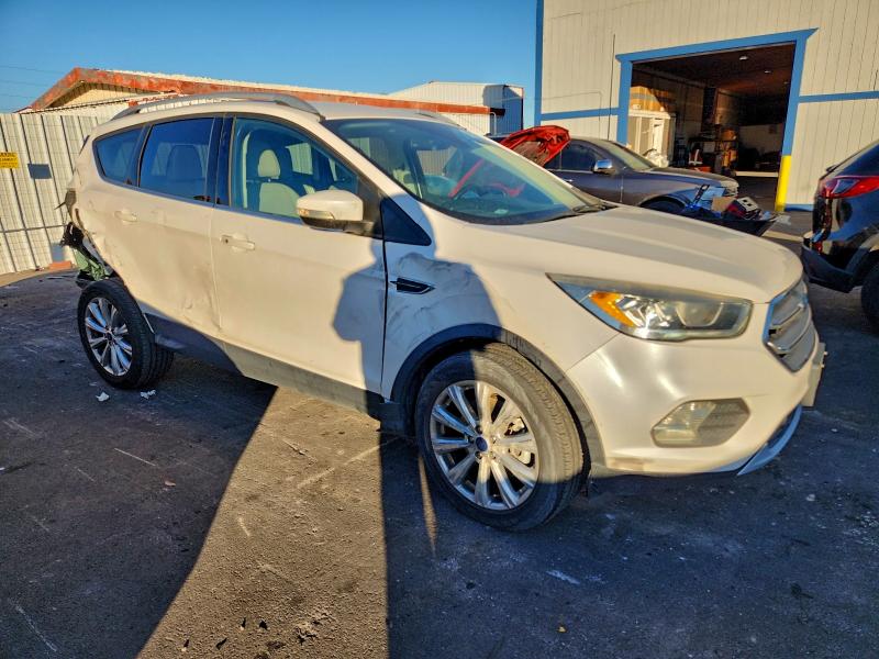 Photo 4 from auction – 2017 FORD ESCAPE with VIN 1FMCU0J90HUE97761