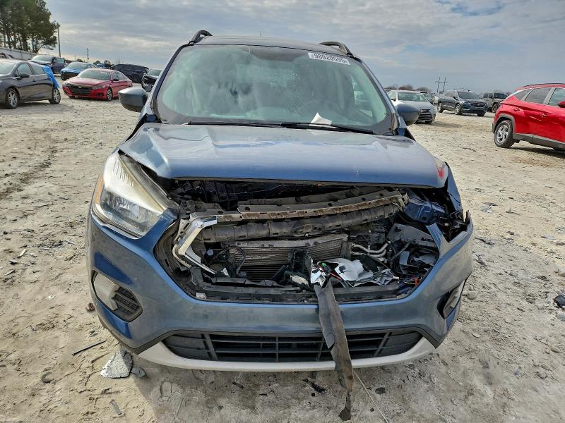 Photo 5 from auction – 2018 FORD ESCAPE SE with VIN 1FMCU0GD4JUA90575