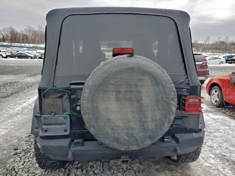 Photo 6 from auction – 2004 JEEP WRANGLER X with VIN 1J4FA39S94P725763