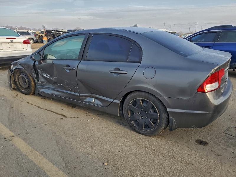 Photo 2 from auction – 2010 HONDA CIVIC LX with VIN 19XFA1F58AE066448