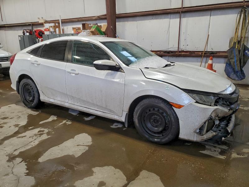 Photo 4 from auction – 2021 HONDA CIVIC LX with VIN 2HGFC2F54MH010128