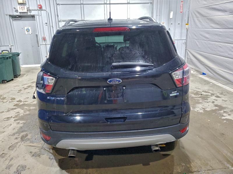 Photo 6 from auction – 2017 FORD ESCAPE SE with VIN 1FMCU9GD9HUC36693