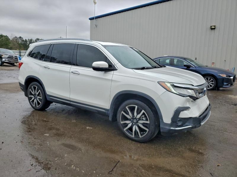 Photo 4 from auction – 2021 HONDA PILOT TOUR with VIN 5FNYF5H64MB012571