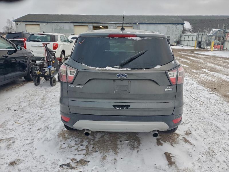 Photo 6 from auction – 2017 FORD ESCAPE SE with VIN 1FMCU9GD4HUB39465