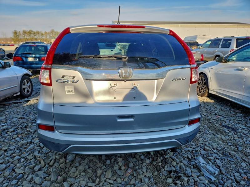 Photo 6 from auction – 2015 HONDA CR-V EX with VIN 2HKRM4H52FH613770
