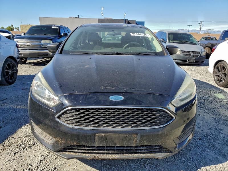 Photo 5 from auction – 2016 FORD FOCUS S with VIN 1FADP3E23GL254194