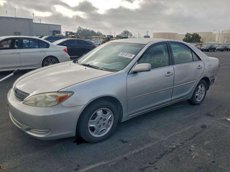 TOYOTA CAMRY LE 2002 with VIN 4T1BF30K02U527358 - Photo from auction
