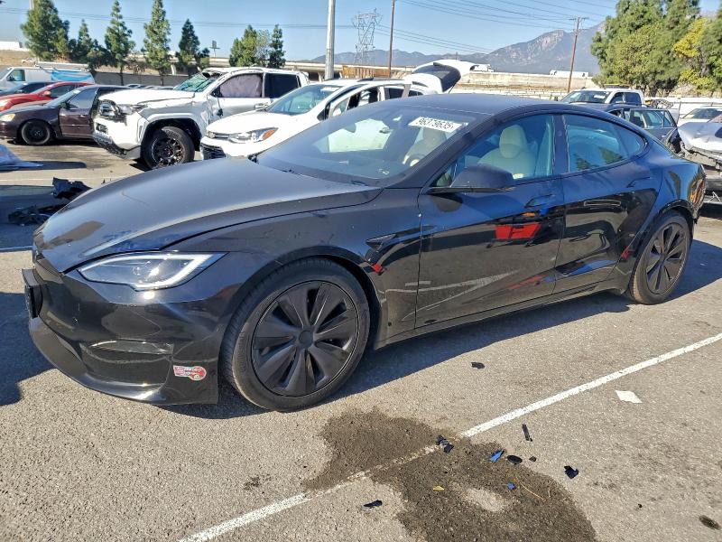 TESLA MODEL S 2023 with VIN 5YJSA1E55PF525941 - Photo from auction
