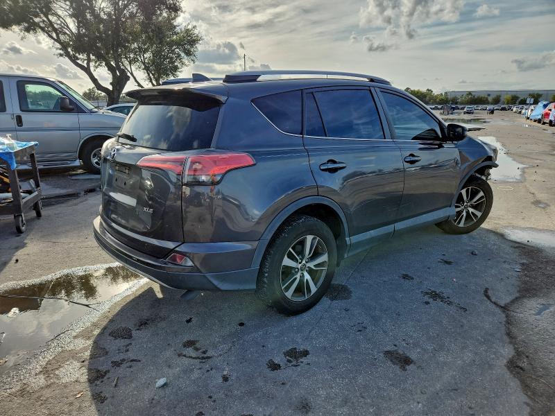 Photo 3 from auction – 2017 TOYOTA RAV4 XLE with VIN 2T3WFREV7HW328671