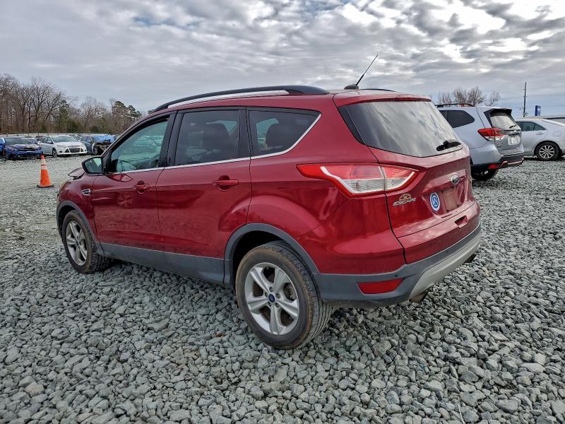 Photo 2 from auction – 2014 FORD ESCAPE SE with VIN 1FMCU0GX7EUB55094