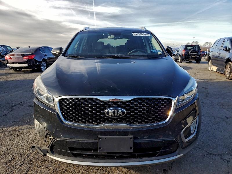 Photo 5 from auction – 2016 KIA SORENTO EX with VIN 5XYPH4A52GG003558