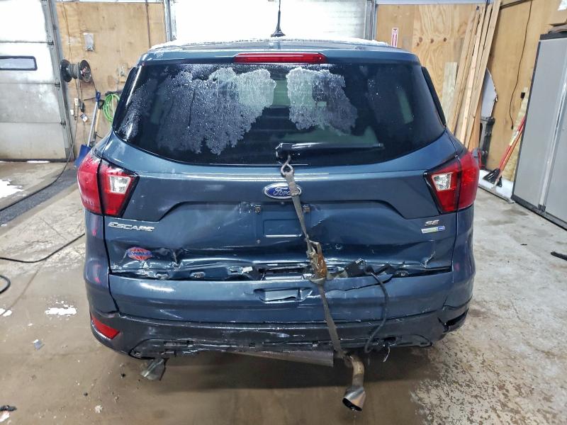 Photo 6 from auction – 2019 FORD ESCAPE with VIN 1FMCU9GD8KUC24459