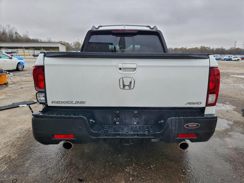 Photo 6 from auction – 2022 HONDA RIDGELINE with VIN 5FPYK3F84NB030484