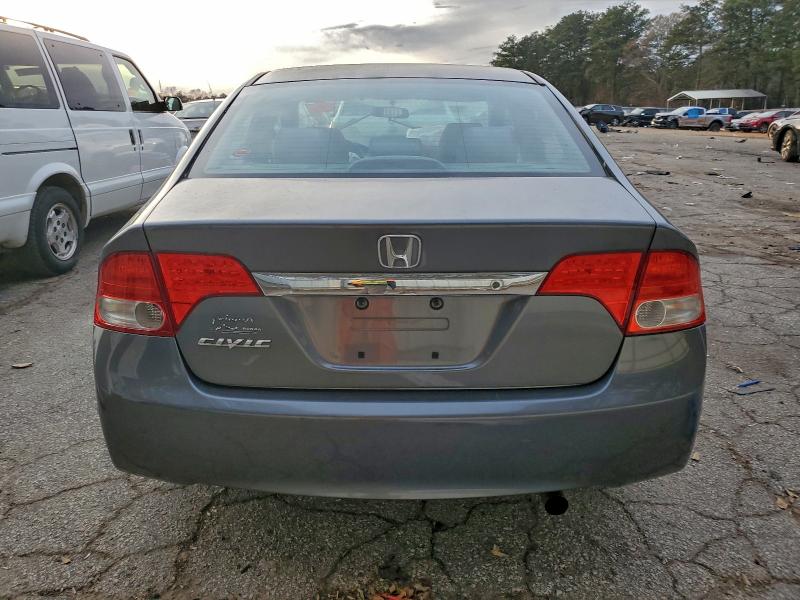 Photo 6 from auction – 2011 HONDA CIVIC VP with VIN 19XFA1F38BE047009