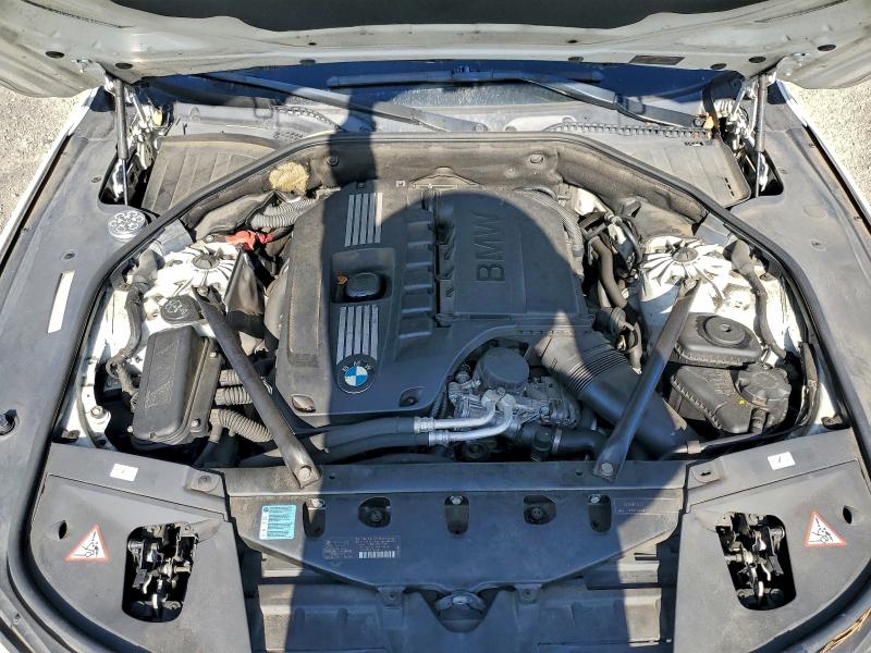 Photo 11 from auction – 2011 BMW 740 LI with VIN WBAKB4C54BC573810