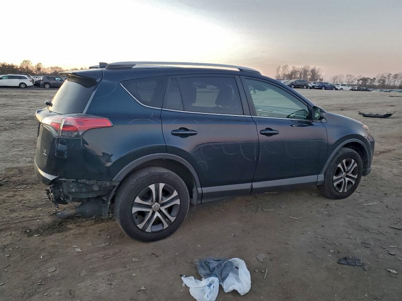 Photo 3 from auction – 2017 TOYOTA RAV4 LE with VIN JTMBFREV5HJ132533
