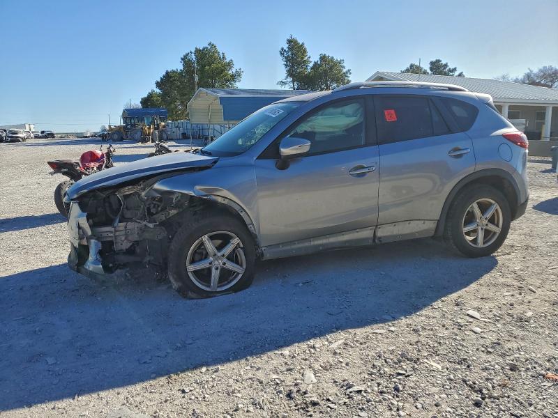 MAZDA CX-5 TOURI 2015 with VIN JM3KE4CY7F0554428 - Photo from auction