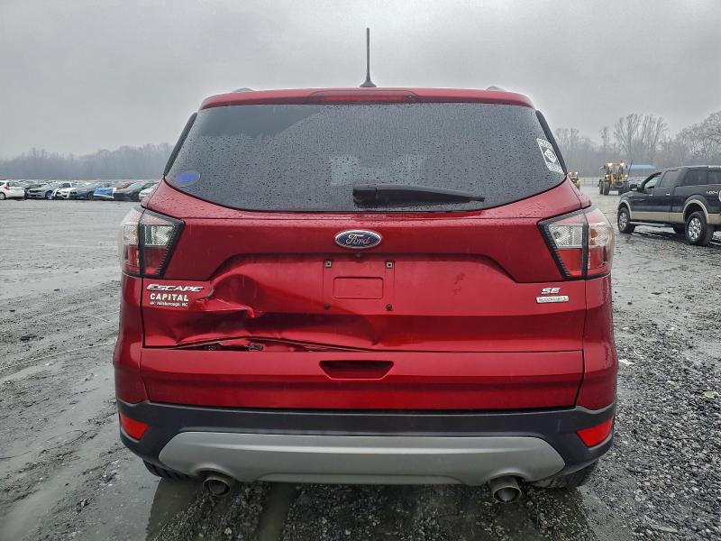 Photo 6 from auction – 2018 FORD ESCAPE SE with VIN 1FMCU0GD4JUA47953