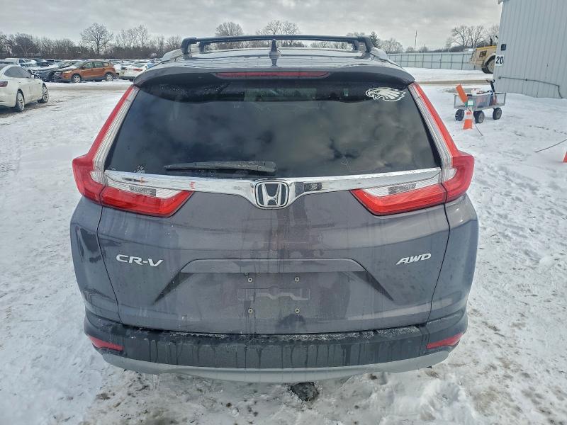 Photo 6 from auction – 2018 HONDA CR-V EX with VIN 7FARW2H56JE083085