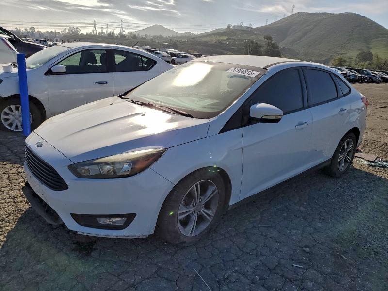 FORD FOCUS SE 2016 with VIN 1FADP3FE9GL331997 - Photo from auction