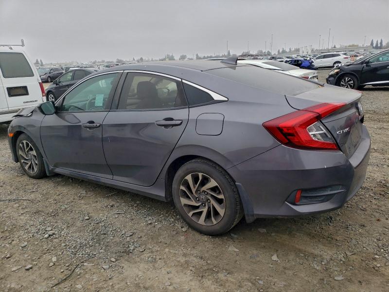 Photo 2 from auction – 2018 HONDA CIVIC EX with VIN 2HGFC2F70JH594430