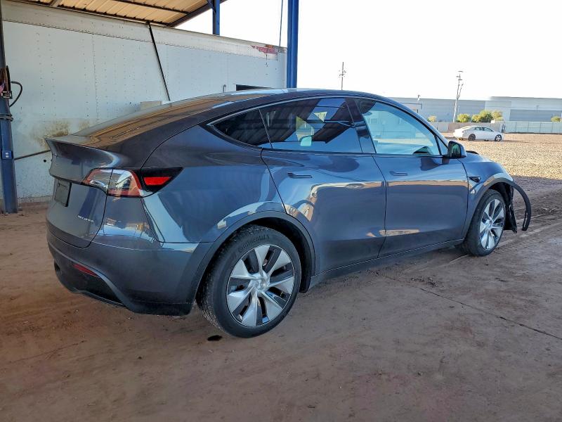 Photo 3 from auction – 2023 TESLA MODEL Y with VIN 7SAYGAEE6PF882847