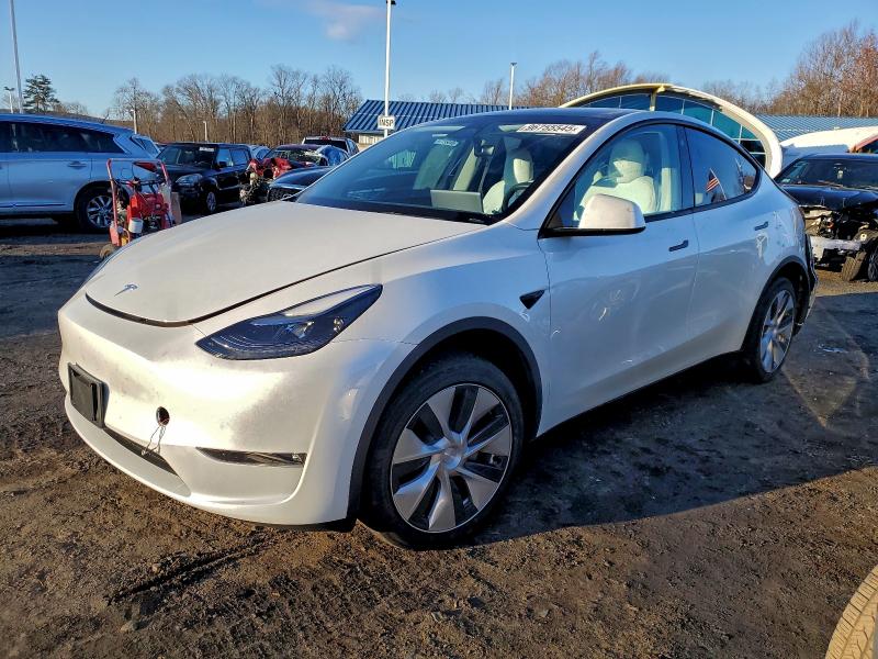 TESLA MODEL Y 2023 with VIN 7SAYGDEE5PF634977 - Photo from auction
