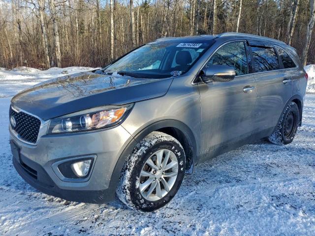 KIA SORENTO LX 2016 with VIN 5XYPGDA54GG151990 - Photo from auction