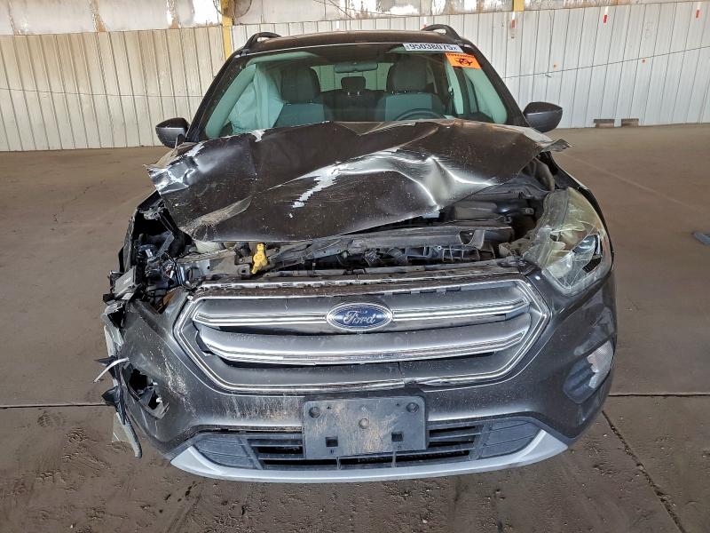 Photo 5 from auction – 2017 FORD ESCAPE SE with VIN 1FMCU9GD7HUD27378