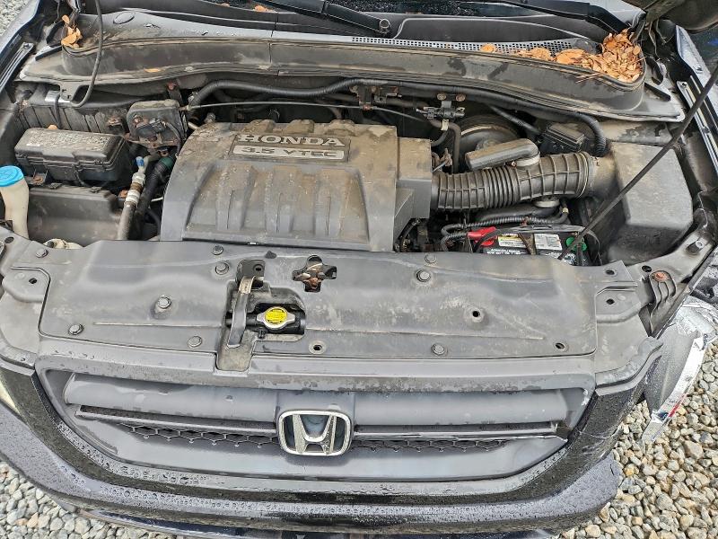 Photo 12 from auction – 2005 HONDA PILOT EXL with VIN 2HKYF18715H522266