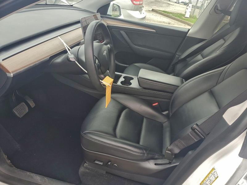 Photo 7 from auction – 2023 TESLA MODEL Y with VIN 7SAYGDEE0PF712629