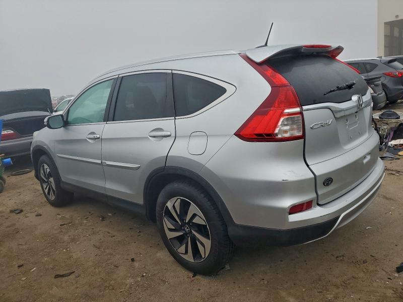Photo 2 from auction – 2015 HONDA CR-V TOURI with VIN 5J6RM4H97FL093364