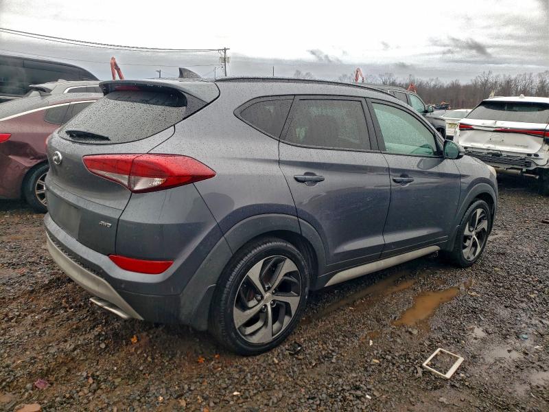 Photo 3 from auction – 2018 HYUNDAI TUCSON VAL with VIN KM8J3CA23JU642568